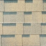 Brown roofing shingles by Capindia, offering a rich, dark-toned roof — perfect for complementing white-painted buildings.