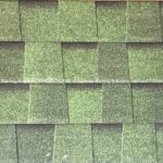 Green roofing shingles by Capindia, blending beautifully with Kerala’s natural greenery for a calm, refreshing roof appearance.