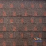 Red stone-coated roof tiles by Capindia, delivering a vibrant, traditional look with superior durability and lightweight strength